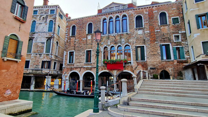 typical canals streets venice italy green water red brick houses magical corners arch