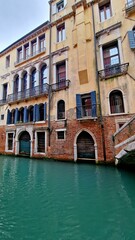 typical canals streets venice italy green water red brick houses magical corners wall