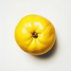 whole quince with vibrant yellow skin isolated on white background