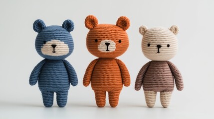 Amigurumi Style Bears in Minimalist Design Featuring Trio of Handmade Crochet Toys in Neutral Tones Against White Background for Modern Nursery Decor or Gift Ideas for Children and Craft Lovers