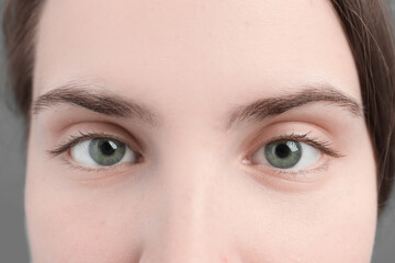 Closeup view of young woman with beautiful blue eyes