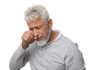 Sad senior man crying on white background