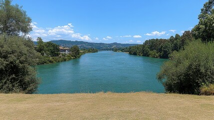 Panoramic view of the Areuse River winding through the NeuchÃ¢tel Jura in Switzerland, surrounded by lush green landscapes and serene nature, capturing the beauty of this tranquil setting.