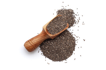 A wooden scoop filled with organic Chia Seeds (salvia hispanica), placed beside a heap of Chia...
