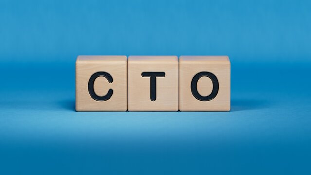 Businesswoman made word cto with wood building blocks.close up of wooden elements,Business Concept.3D rendering on blue background.