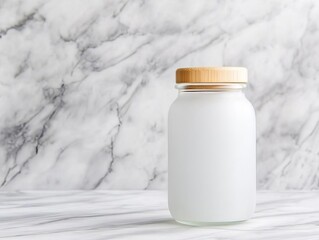 Frosted glass jar with a bamboo lid, positioned on a modern marble background