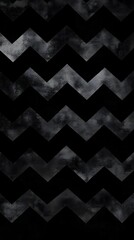 Fototapeta premium A textured pattern of zigzag lines in varying shades of black and gray.