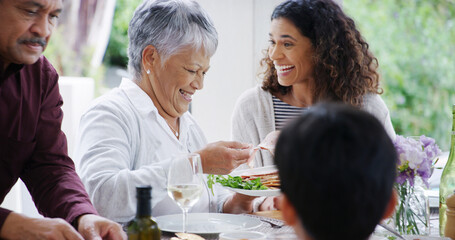 Thanksgiving, dinner and family with eating by home for bonding, festive celebration or social gathering. Happy people, food or conversation together on patio with love, holiday lunch or relationship