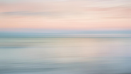 Obraz premium Blurred by the motion of panning, the sky and ocean create a defocused visual experience