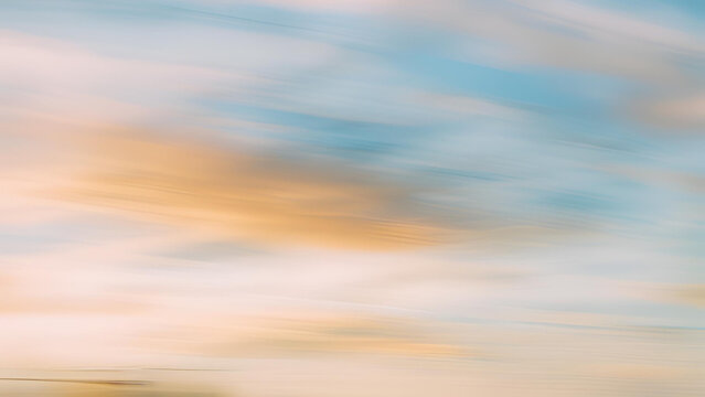 The sky and ocean appear out of focus, enhanced by a sweeping motion that adds a dynamic blur