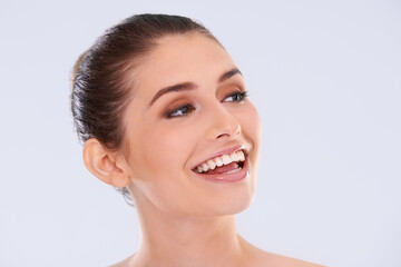 Obraz premium Beauty, skincare and portrait of woman with confidence, mockup and facial cosmetics in studio. Dermatology, health and face of girl with natural makeup, glow and skin care shine on white background