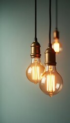 Vintage Edison light bulb lamps hang from ceiling with soft warm glow , cafe, vintage
