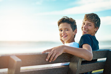 Bench, portrait or boys at beach with smile or love for fun summer vacation, holiday or mockup...