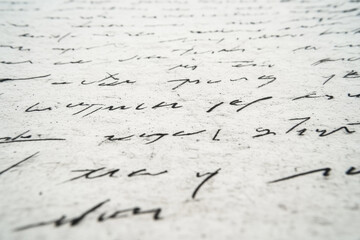 The image is a close up of a piece of paper with a lot of writing on it