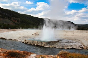 Cliff Geyser Erupting in the Upper Geyser Basin in Yellowstone National Park Wyoming.