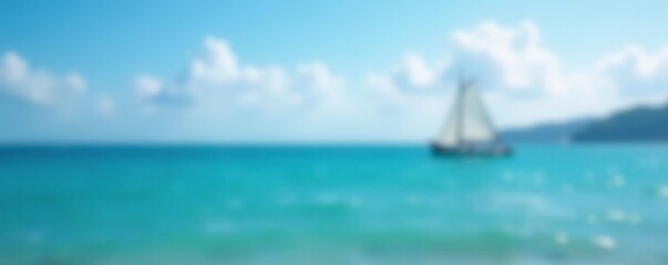 Obraz premium blurred blue ocean view with sailboat in the distance, blurry effect, outdoor landscape, calming atmosphere