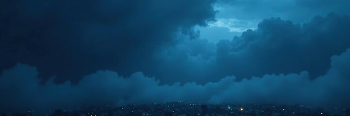 Obraz premium Moody dark blue background with subtle hints of mist, muted, gloomy, atmospheric