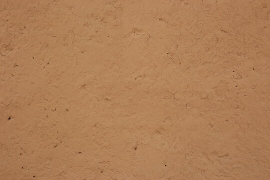 wall of home made from mud or adobe house. Clay wall texture of House structure.Selective focus