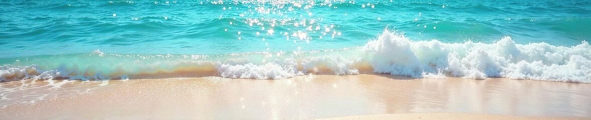 Fototapeta premium Calm blue waters reflecting sunlight as waves roll onto the sandy beach, water, beach