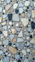 Natural breccia marble breccia background with scattered gray and black fragments and white dots, stone texture, natural marble