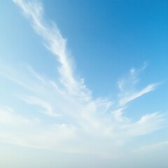 Obraz premium Soft blue sky with thin cirrus clouds scattered across the horizon, clear sky, light blue
