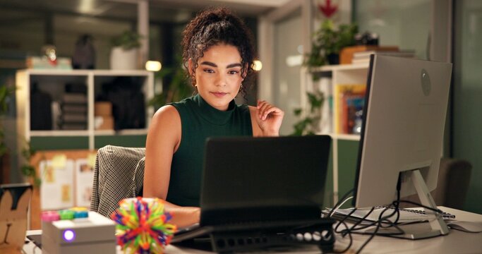 Business woman, laptop and brainstorming with internet, creative agency and ideas for night thinking. Girl, brand consultant and multi screen computer with project, proposal and startup for office