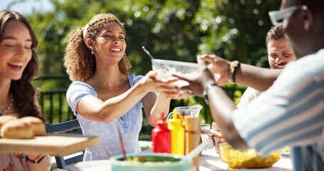 Friends, party and serving lunch outdoor for new year celebration, sharing meal or bonding together. Terrace, people or happy with barbecue food at social event for festive reunion and holiday fun