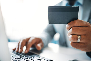 Business person, credit card and hand with laptop for online shopping, subscription service or...