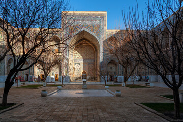 Courtyard and entrance portal of Ulugbek Madrasah, the oldest madrasah of the architectural...