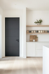 Fototapeta premium Modern interior design featuring sleek black door and minimalist shelving in bright space
