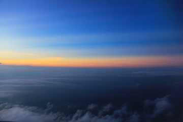 Blue sky clouds background, beautiful landscape with clouds and orange sun on sky