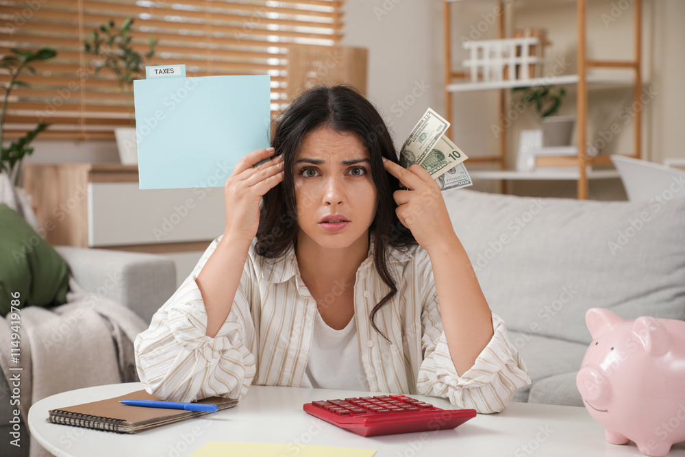 Sticker Tired young woman with piggy bank and calculator doing taxes at home. Stress concept