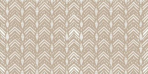 Stylish beige chevron pattern with textured design elements, perfect for modern home decor.