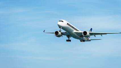 Passenger liner in the blue sky
