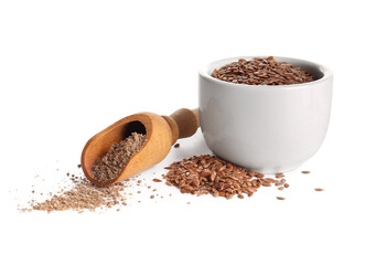 Bowl of flax seeds and wooden scoop with flour on white background