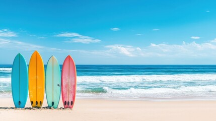 Colorful Surfboards on Sandy Beach Against Ocean Waves and Sky