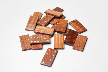 Wooden dominos blocks on grey background