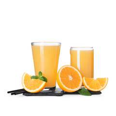 Glasses of tasty juice with oranges, straws and mint leaves on white background
