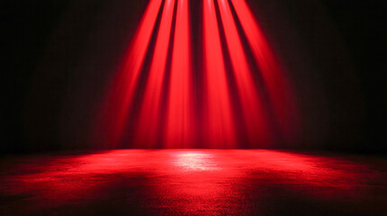 Dramatic red spotlight shining on empty stage in dark theater