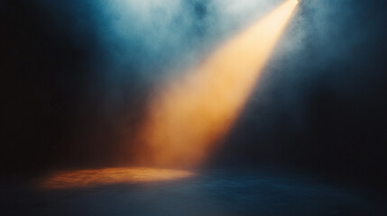 Obraz premium Stage spotlight illuminating smoke in a dark performance space. 