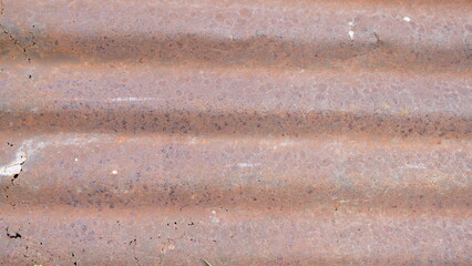 Textured Rusty Metal Surface with Worn Corrugated Pattern