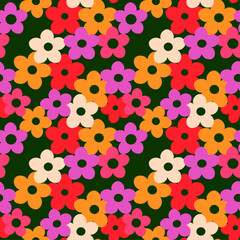 Colorful flower shapes on dark green background seamless vector pattern
