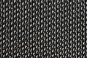 Texture of black fabric. Artificial dense fabric for backpacks bags and covers. Background, texture.