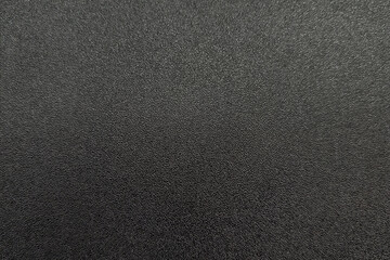 Detailed texture of black woolen cloth surface. Abstract background or texture. Blank for design