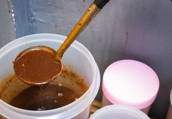 Boiled Fermented Fish sauce , traditional thai food preserved call in thai Pla ra.