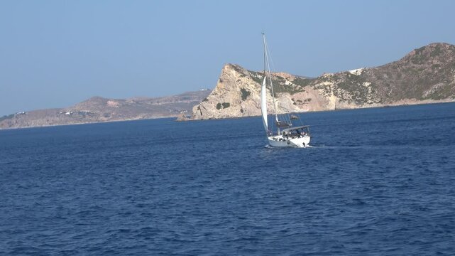 Fast tracking on a yacht while sailing. Fast tracking and focusing on a yacht while sailing with open sails