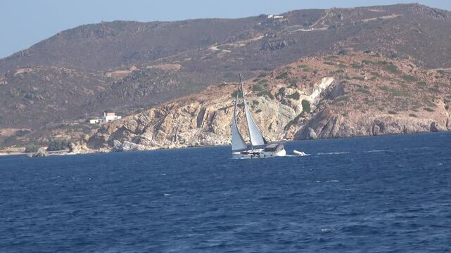 Fast tracking on a yacht while sailing. Fast tracking and focusing on a yacht while sailing with open sails