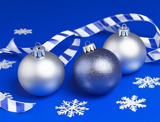 Elegant Silver and Blue Christmas Baubles with Ribbon and Snowflakes