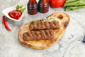 Kebab with beef served onion