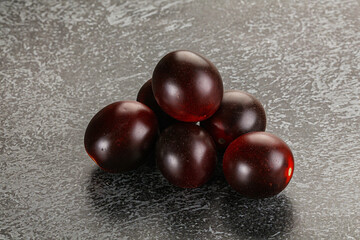 Raw ripe black kumato tomato